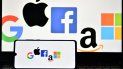 Logotipos de Google, Apple, Facebook, Amazon y Microsoft muestran en un teléfono móvil y una pantalla de ordenador portátil. Logotipos de Google, Apple, Facebook, Amazon y Microsoft muestran en un teléfono móvil y una pantalla de ordenador portátil.