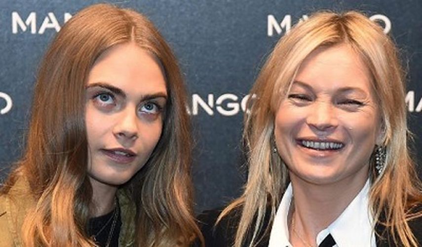 Las modelos británicas Cara Delevingne y Kate Moss en la apertura de la nueva tienda de la marca española Mango. (EFE)