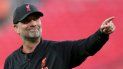 El técnico de Liverpool Jurgen Klopp sonríe y gesticula tras la final de la Copa FA ante Chelsea, el 14 de mayo de 2022.