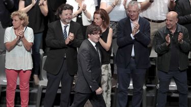 El presidente de la Generalitat, Carles Puigdemont, a su llegada al acto &nbsp;Garantías para la democracia: Por un referéndum legal, efectivo y vinculante.&nbsp;