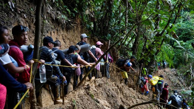 &nbsp;Migrantes, en su mayoría venezolanos, cruzan el Tapón del Darién desde Colombia hacia Panamá, con la esperanza de llegar a Estados Unidos el 15 de octubre de 2022.