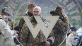 Visitantes vestidos con ropa de camuflaje militar en la entrada del Centro Wagner PMC, vinculado al empresario y fundador del grupo militar privado Wagner, Yevgeny Prigozhin, durante la apertura del bloque de oficinas durante el Día de la Unidad Nacional, en San Petersburgo, Rusia.