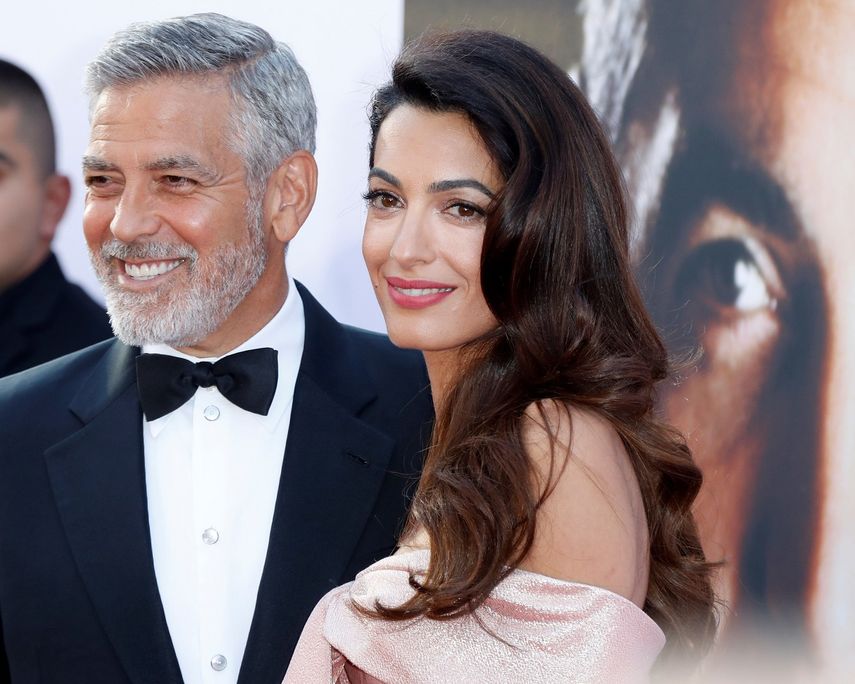 El actor estadounidense&nbsp;George&nbsp;Clooney y su esposa, Amal&nbsp;Clooney, a su llegada a la gala de entrega del premio que otorga el Instituto de Cine Americano (AFI), en el teatro The Dolby Theatre de Hollywood.