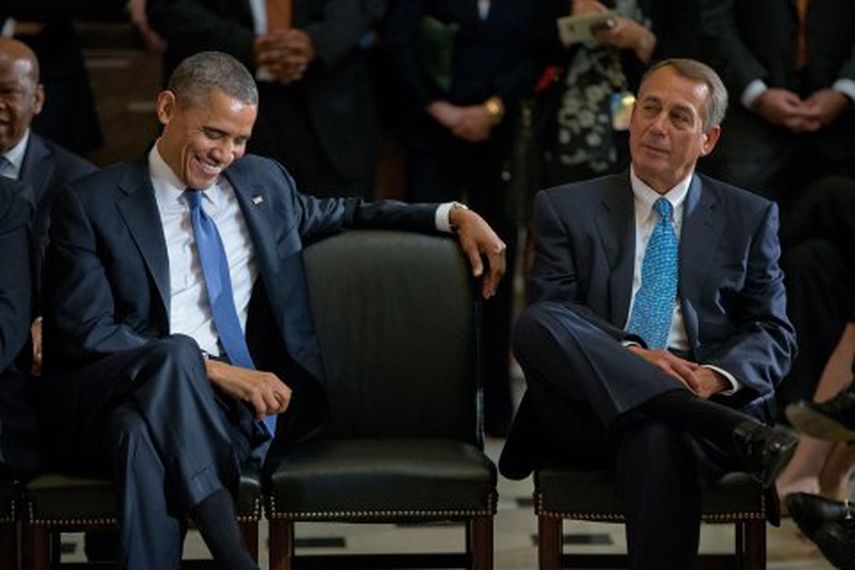 El presidente Barack Obama y el líder republicano John Boehner, en el servicio funerario de Tom S. Foley el 29 de octubre del 2013. (AP)