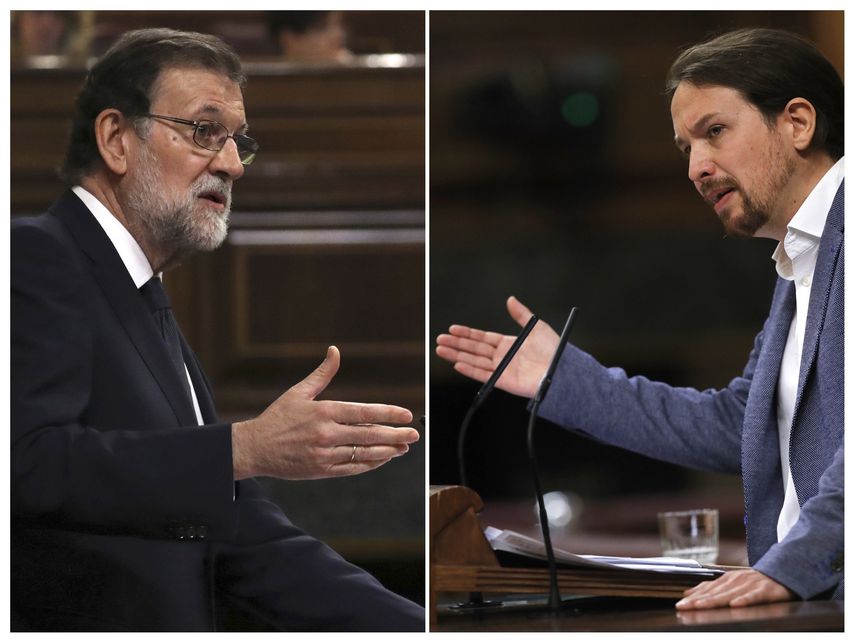 El presidente del Gobierno, Mariano&nbsp;Rajoy&nbsp;(i), y el líder de Podemos, Pablo Iglesias, durante sus respectivas intervenciones &nbsp;en el Congreso de los Diputados, en el debate de la moción de censura de Unidos Podemos contra el primero.
