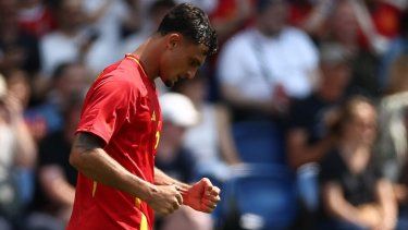 El defensor español Marc Pubill celebra luego de anotar el primer gol de su selección en un partido de los Juegos Olímpicos, el 24 de julio de 2024.