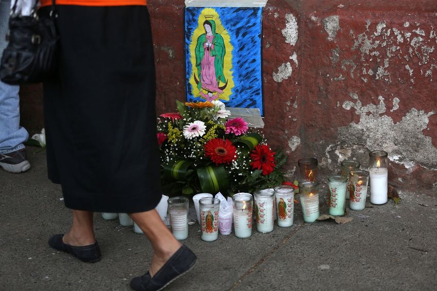 Altar en honor a las víctimas del incendio en hogar Virgen de la Asunción.