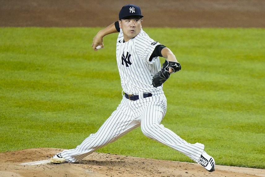 &nbsp;En esta foto del 17 de septiembre de 2020, el pitcher japonés Masahiro Tanaka de los Yanquis de Nueva York lanza ante los Azulejos de Toronto.&nbsp;