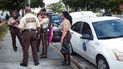Miembros de la fuerza policial del condado Miami-Dade. Miembros de la fuerza policial del condado Miami-Dade.