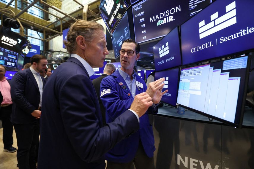 Agentes de la Bolsa de Nueva York en el piso de remate.