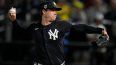 El abridor de los Yanquis de Nueva York, Gerrit Cole, lanza en la primera entrada del juego de exhibición ante los Azulejos de Toronto, el viernes 1 de marzo del 2024.