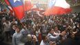 Simpatizantes del expresidente de&nbsp;Chile&nbsp;y candidato presidencial de la coalición&nbsp;Chile&nbsp;Vamos, Sebastián&nbsp;Piñera esperan los resultados del escrutinio en Santiago (Chile).&nbsp;