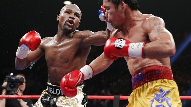 En la noche en la que Mayweather Jr defendió su invicto y derrotó Manny Pacquiao (EFE)