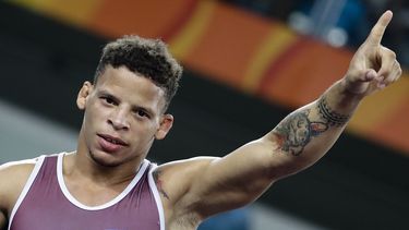 Ismael Borrero Molina de Cuba celebra después de ganar la medalla de oro en la competencia masculina de lucha grecorromana de 59 kg en los Juegos Olímpicos de Verano de 2016 en Río de Janeiro, Brasil, el domingo 14 de agosto de 2016.&nbsp;